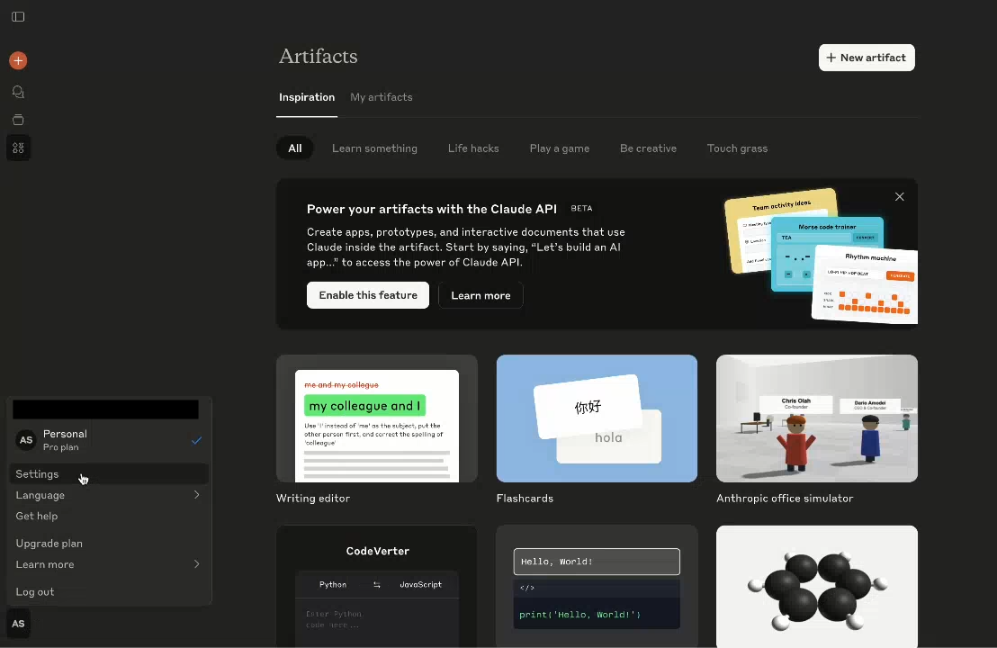 Claude interface with profile menu open and Settings option selected from the account menu