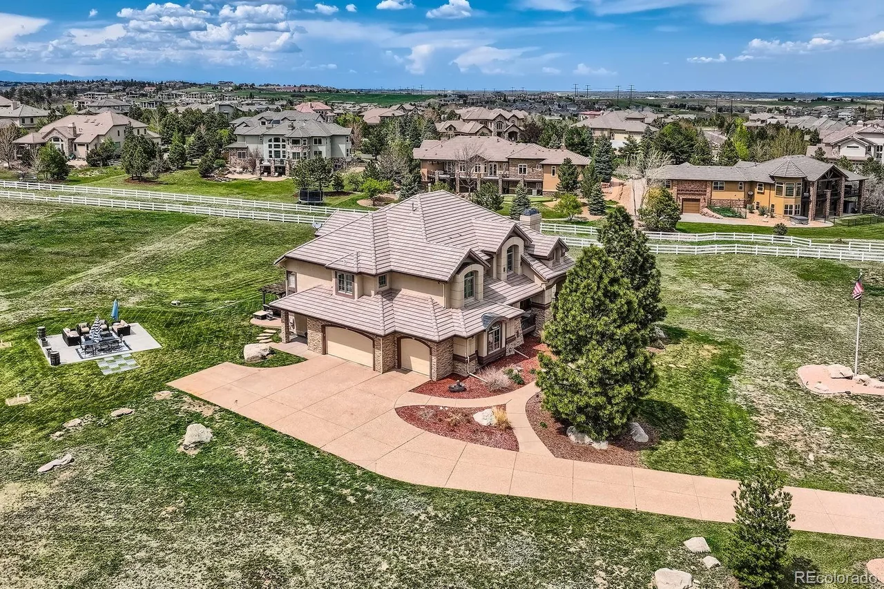 Listing exterior still image used as the source frame for a Veo generated drone style clip